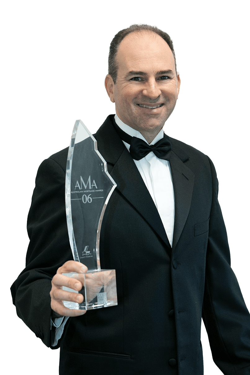 Peter Goldberg from Pinnacle capital wearing a black suit in AMA Award ceremony holding an award